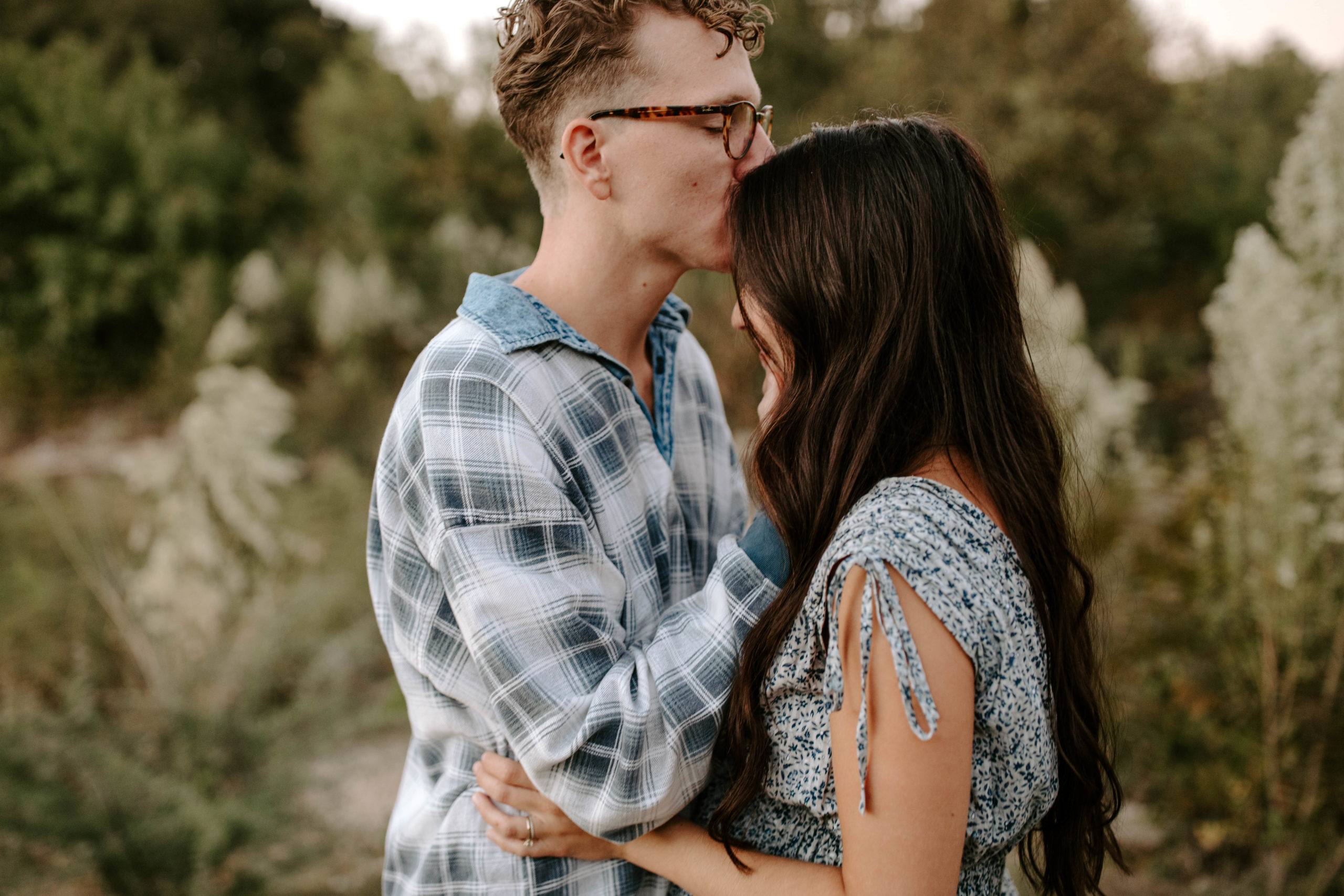 This dreamy couple session at Blue Hole Park in Georgetown, Texas is the perfect picture of natural moments. The photography by Sullivan Taylor are true to color, while still being warm & moody. We love seeing two people candidly in love! Looking for a wedding and elopement photographer who goes all over Texas? If you want timeless images that are true to color and warm, contact Sulli Taylor.